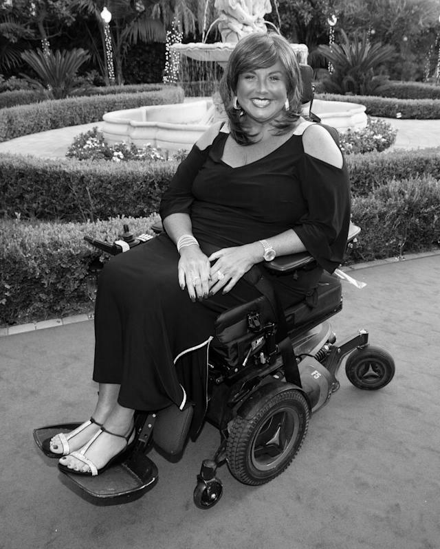 Why is Abby Miller in a wheelchair? image 1