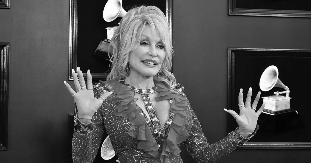 Why does Dolly Parton wear gloves? image 1