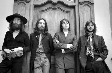 The Beatles’ last photo as a group, black and white photo of men leaning in a door